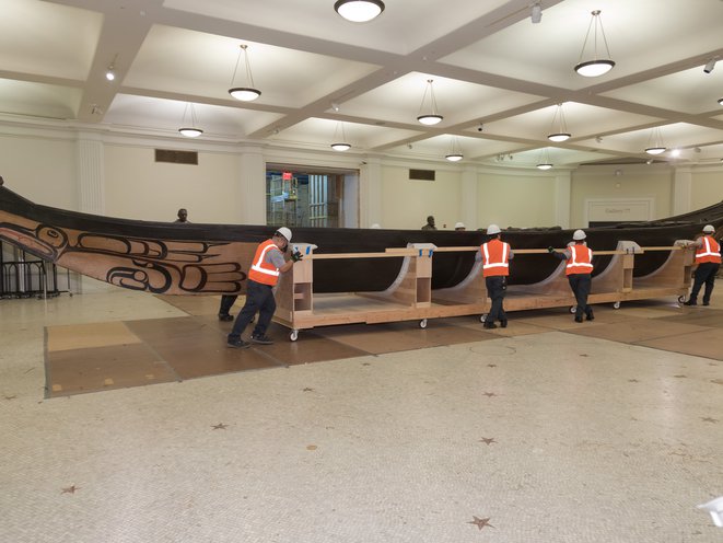 Canoe being moved inside of AMNH