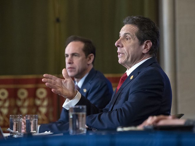 Health Commissioner Howard Zucker and Governor Andrew Cuomo speak at a COVID-19 briefing in Albany on Wednesday.