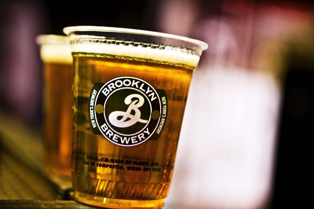 A photo of a glass pint with the Brooklyn Brewery logo.