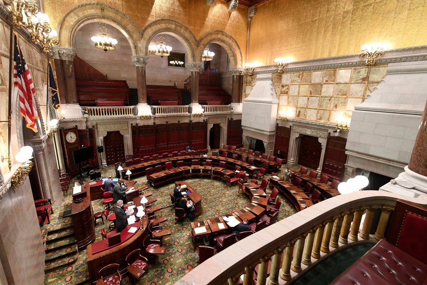 New York State Senate members work during a Senate session at the state Capitol, in Albany, N.Y