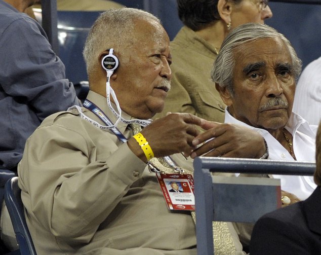 Mayor David Dinkins and Rep. Charles Rangel sit in the stands of the US Open