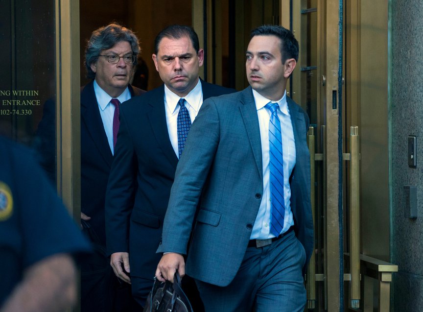 Joe Percoco, center, a former executive deputy secretary to Gov. Andrew Cuomo, leaves federal court in New York in 2016.