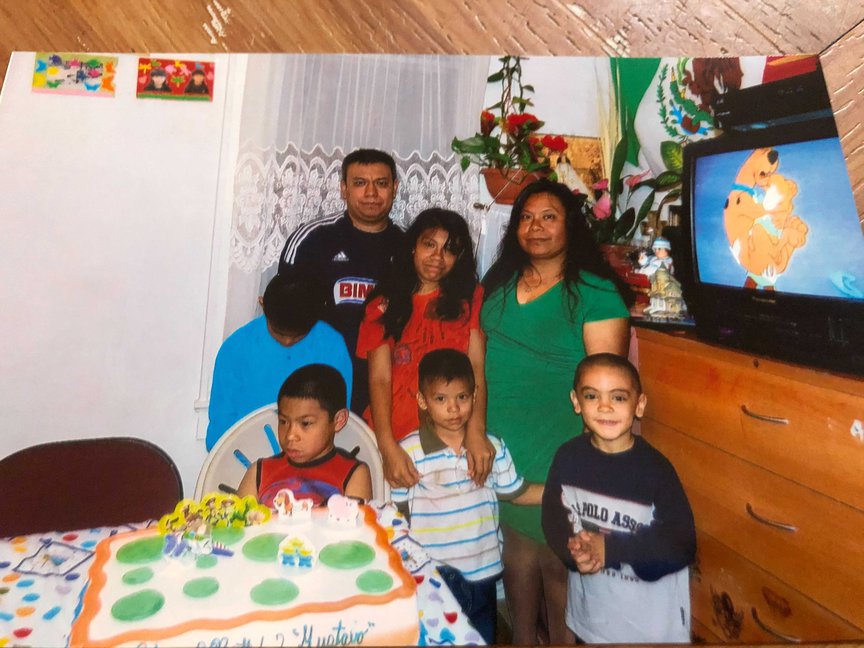 Reinaldo Rojano and Zenaida Morales with three of their children and two nephews.
