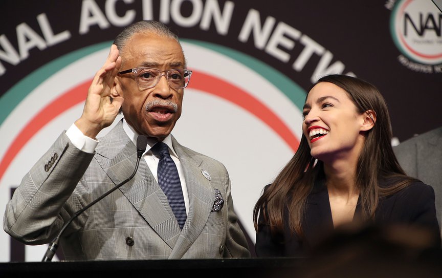 Reverend Al Sharpton and Alexandria Ocasio-Cortez at the National Action Network headquarters in 2019.