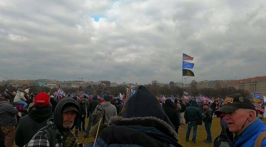 A wide shot of hundreds of people at the Capitol on January 6; Durfee is on the right