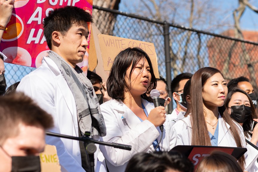 A photo of healthcare workers at a rally against anti-Asian discrimination and hate.