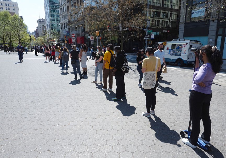 People line up for a free joint giveaway in Union Square