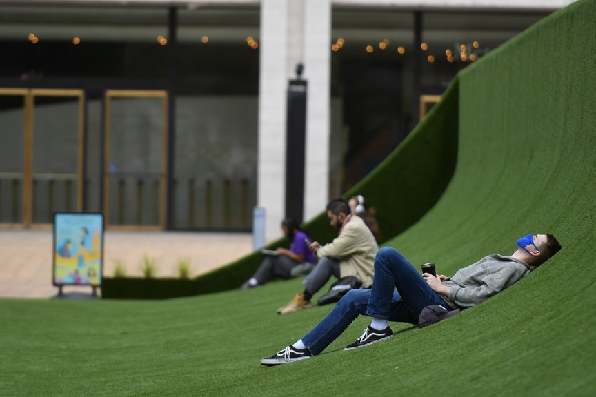 Photographs of the big green lawn across Lincoln Center's plaza
