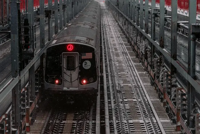 A J train crossing the Williamsburg Bridge.