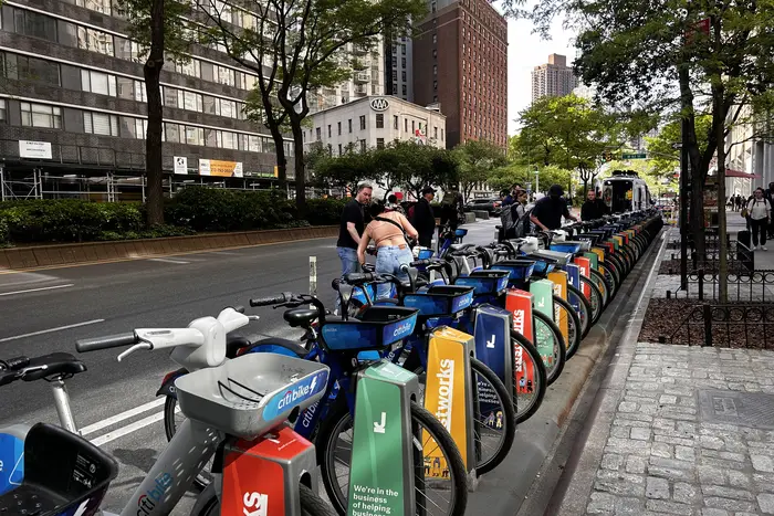 Riders pick up and drop off Citi Bikes at a docking station on the Upper West Side.