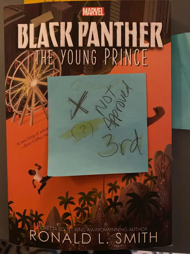A copy of "Black Panthers: The Young Prince" with a note reading "not approved."