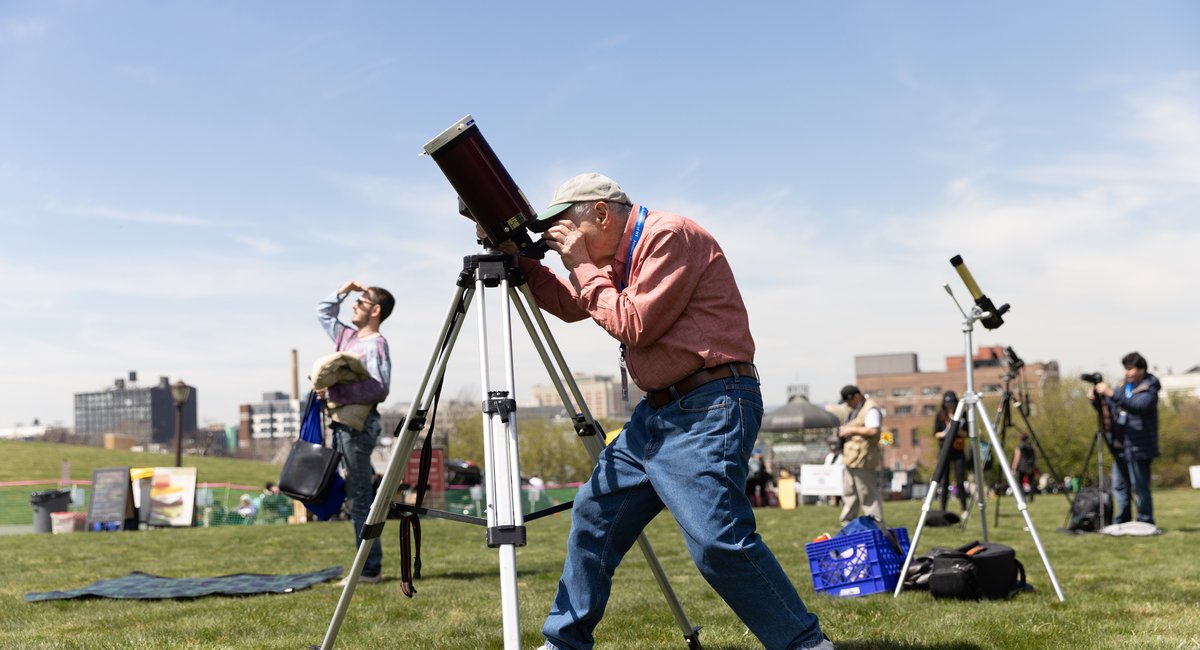 New Yorkers flock to highest point in Brooklyn to watch eclipse